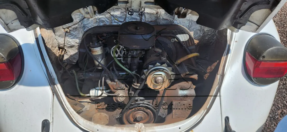 LOTE 794 - Automóvel VW FUSCA 1600, ano 1985, cor branca, em bom estado de conservação