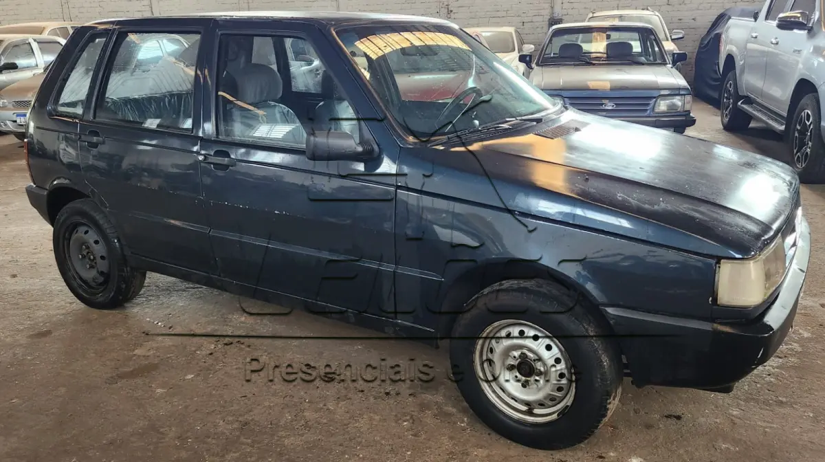 LOTE 010 - Automóvel Fiat Uno Electronic, 1995, cor azul, à gasolina