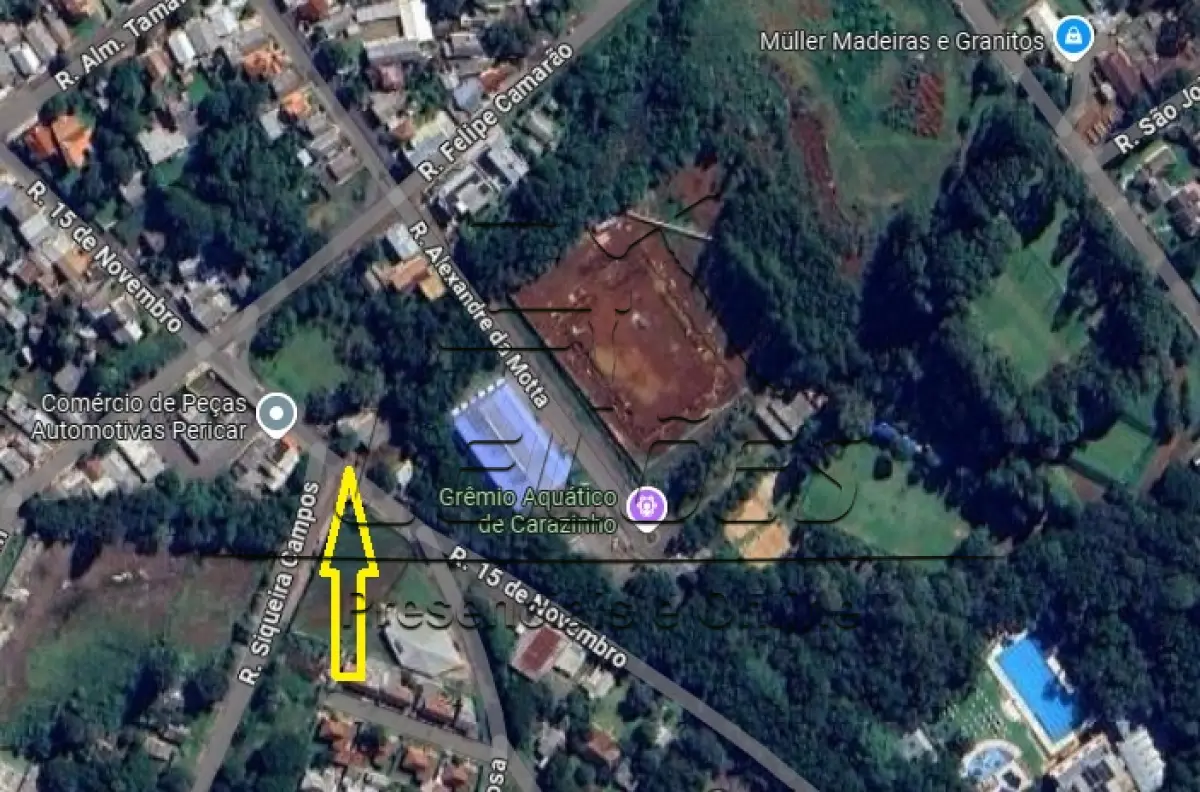LOTE 002 - Terreno urbano com a área de 420m², medindo 14m de frente por 30m de frente a fundos, situado na Rua XV de Novembro, distante 64m da esquina com a Rua Felipe Camarão, lote 09 da quadra 42 no setor 06, com uma casa tipo mista com a área de 246,63m². Imóvel objeto da matrícula nº 9.131 do livro 2-RG do Registro de Imóveis de Carazinho.