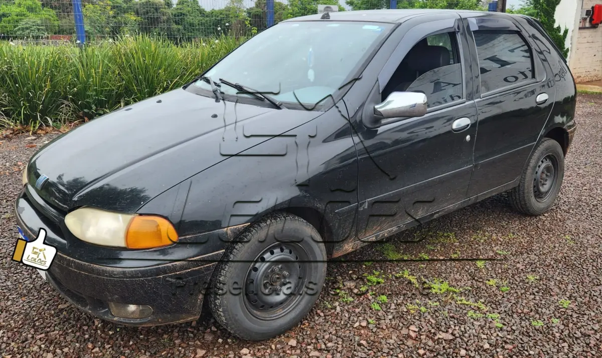 LOTE C-002 - FIAT/PALIO EX, ano/modelo 1999/1999, cor preta, à gasolina, 4 portas, emplacado em Carazinho/RS.