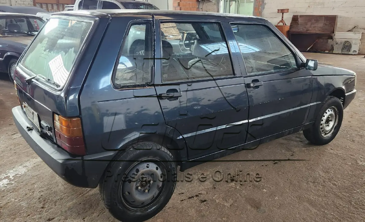 LOTE 010 - Automóvel Fiat Uno Electronic, 1995, cor azul, à gasolina
