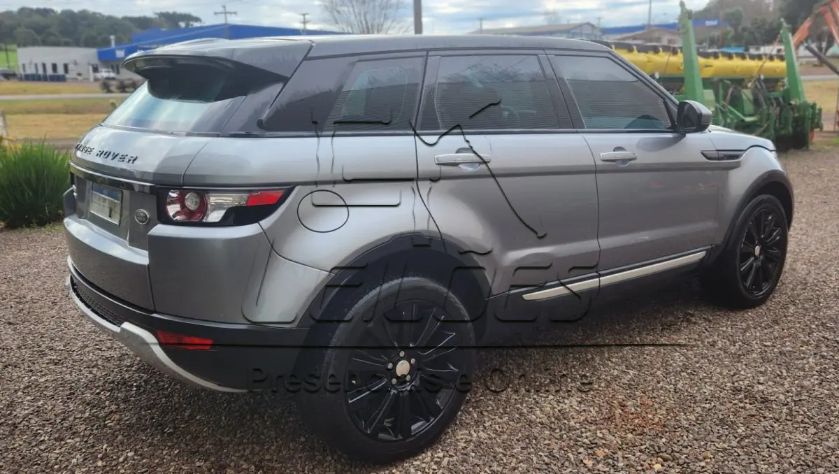 LOTE 854 - I/LR EVOQUE PRESTIGE 2.2, 2014/2015, top de linha, cor cinza, motorização a diesel e com 190cv de potência.