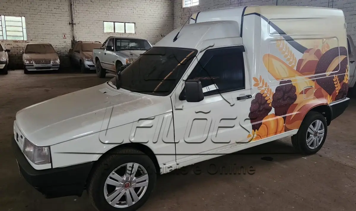 LOTE C-002 - Caminhonete FIAT/FIORINO IE, ano/modelo 1999/1999, cor branca, carroceria furgão, à gasolina e com 76cv de potência