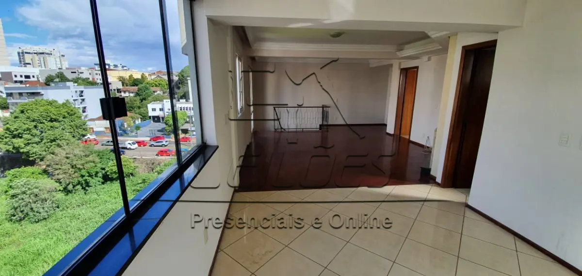 LOTE 01 - Apartamento duplex nº 604 e box  duplo nº 14 do Edifício Sevilha, Centro de Carazinho