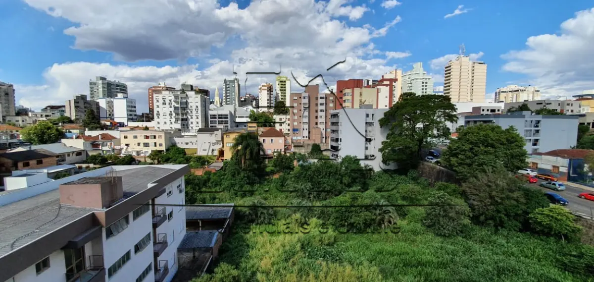 LOTE 01 - Apartamento duplex nº 604 e box  duplo nº 14 do Edifício Sevilha, Centro de Carazinho