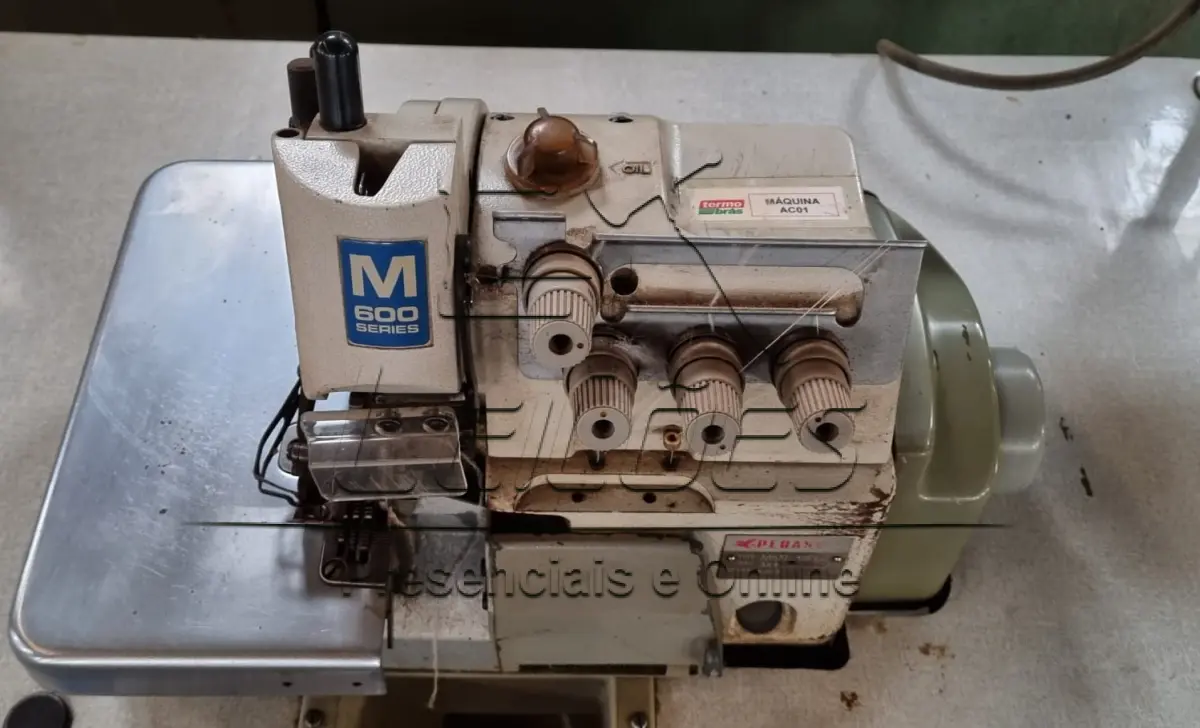 LOTE 12c - 01 máquina overlock AC da marca Pégasus, em bom estado de conservação