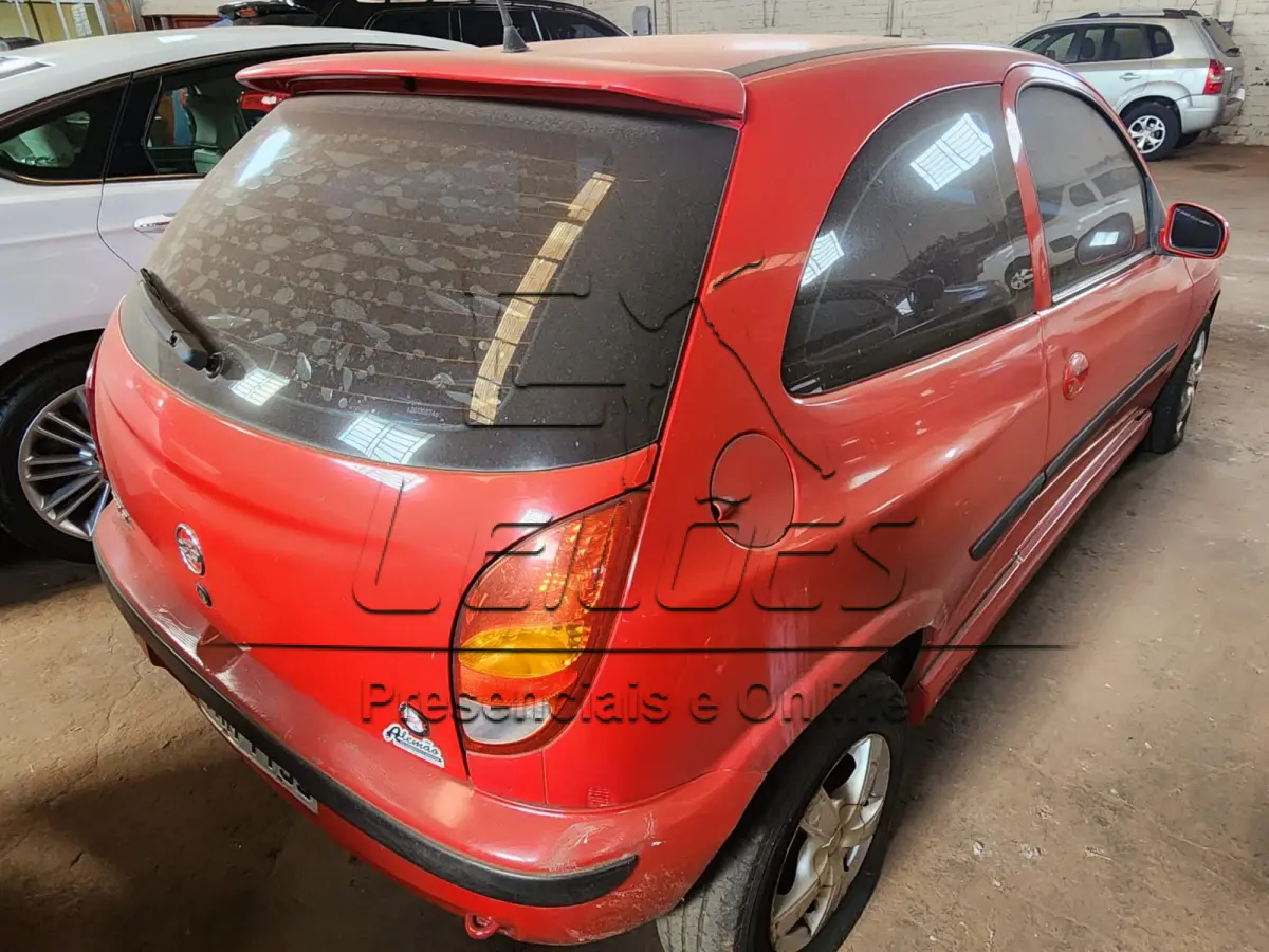 LOTE 008 - GM/ CELTA 1.0 3 portas, ano/modelo 2002/2002, cor vermelha, à gasolina