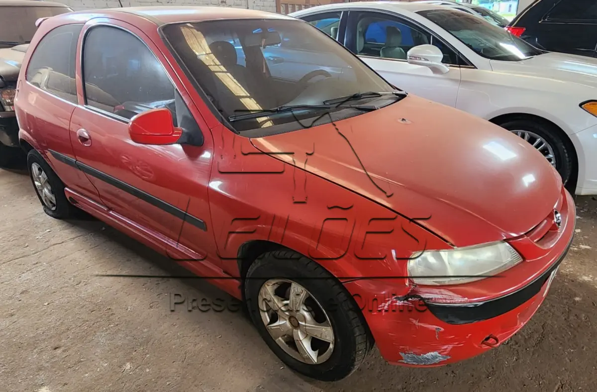 LOTE 008 - GM/ CELTA 1.0 3 portas, ano/modelo 2002/2002, cor vermelha, à gasolina
