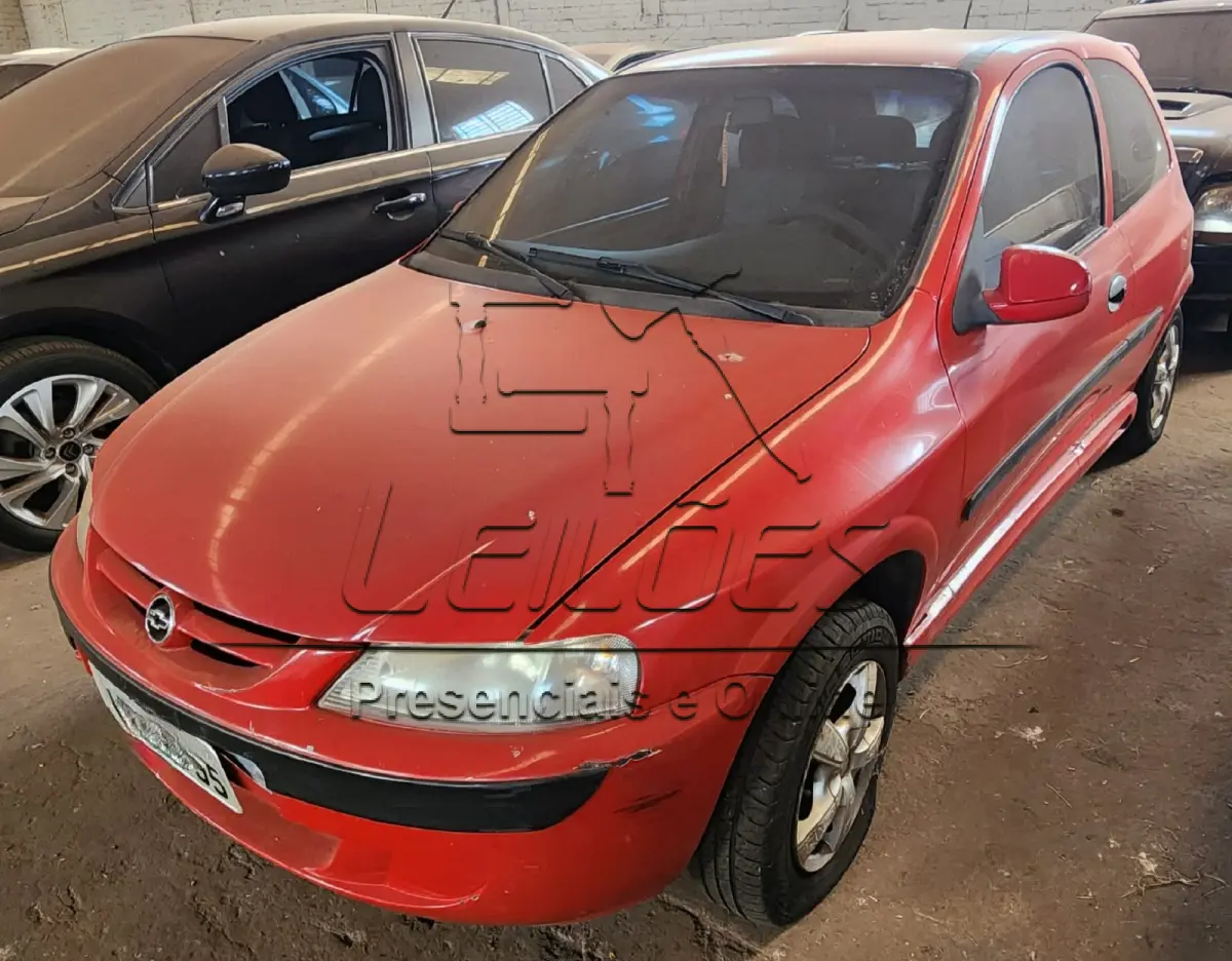 LOTE 008 - GM/ CELTA 1.0 3 portas, ano/modelo 2002/2002, cor vermelha, à gasolina