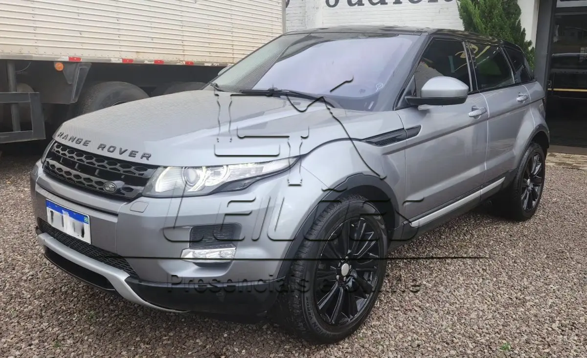 LOTE 854 - I/LR EVOQUE PRESTIGE 2.2, 2014/2015, top de linha, cor cinza, motorização a diesel e com 190cv de potência.