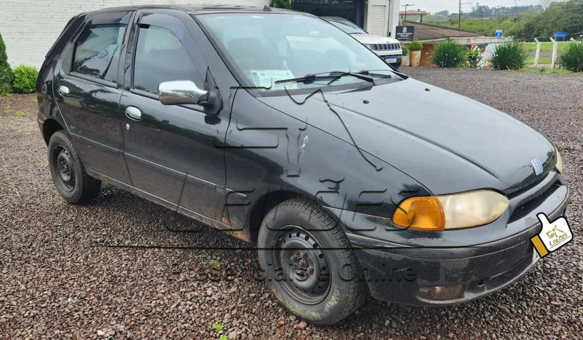 LOTE C-002 - FIAT/PALIO EX, ano/modelo 1999/1999, cor preta, à gasolina, 4 portas, emplacado em Carazinho/RS.