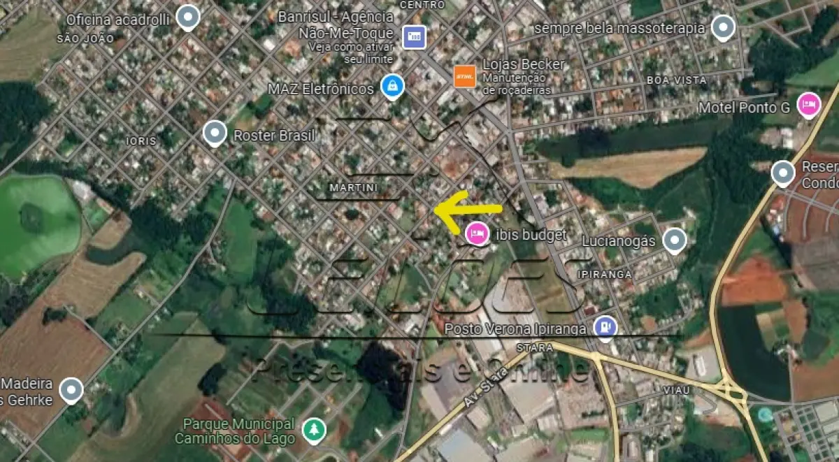 LOTE 001 - Terreno urbano com área de 380,25m², situado no lado ímpar da Rua Pinheiro Machado, esquina com a Rua Senador Alberto Pasqualini, lote 304 da quadra 82, no Loteamento Irmãos Martini, na cidade de Não-Me-Toque/RS. Sobre o referido terreno há a construção de uma casa de alvenaria, coberta com telhas de cimento amianto, com 69,88m², devidamente averbada na matrícula conforme Av.7-3.176. Contudo, conforme constante no laudo de avaliação, a edificação possui 163,29m². Imóvel objeto da matrícula nº 3.176 do Registro de Imóveis de Não-Me-Toque.