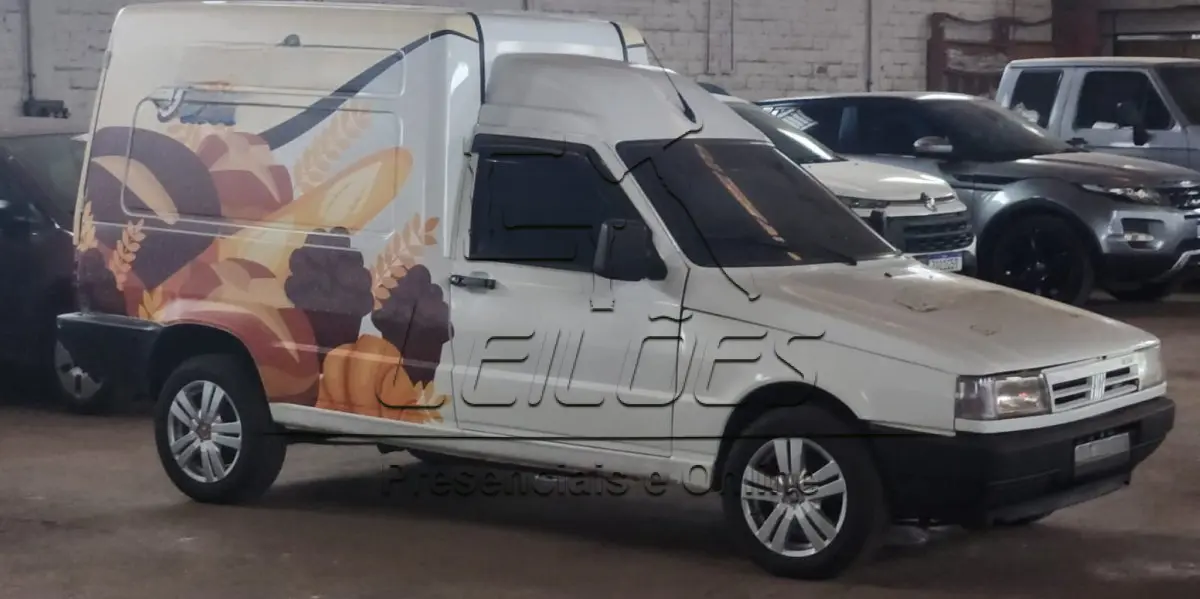 LOTE C-002 - Caminhonete FIAT/FIORINO IE, ano/modelo 1999/1999, cor branca, carroceria furgão, à gasolina e com 76cv de potência