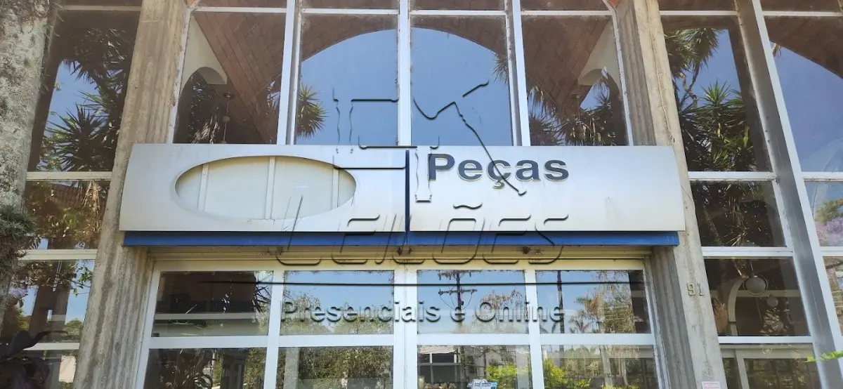 LOTE 135 - Placa de publicidade (emblema da marca e peças)